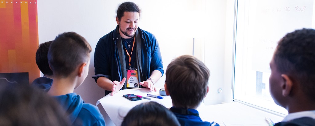 A practitioner leads a workshop