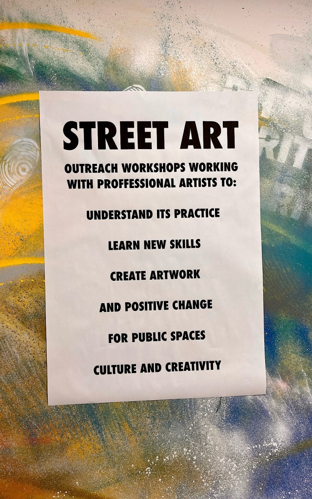 A sign in an art gallery says ‘street art’