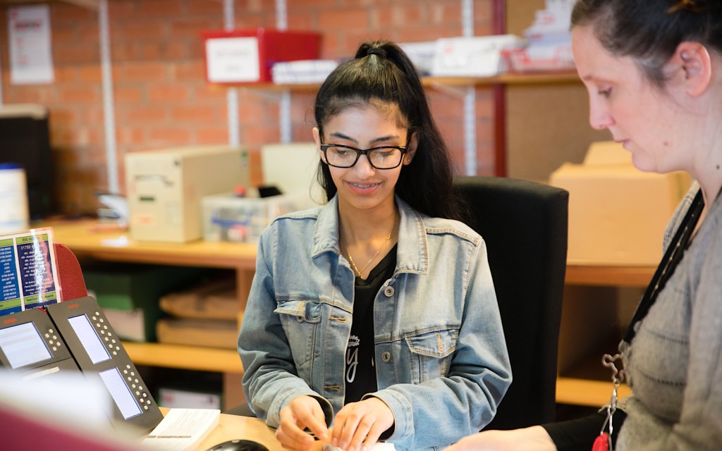 A student is at a theatre careers fair
