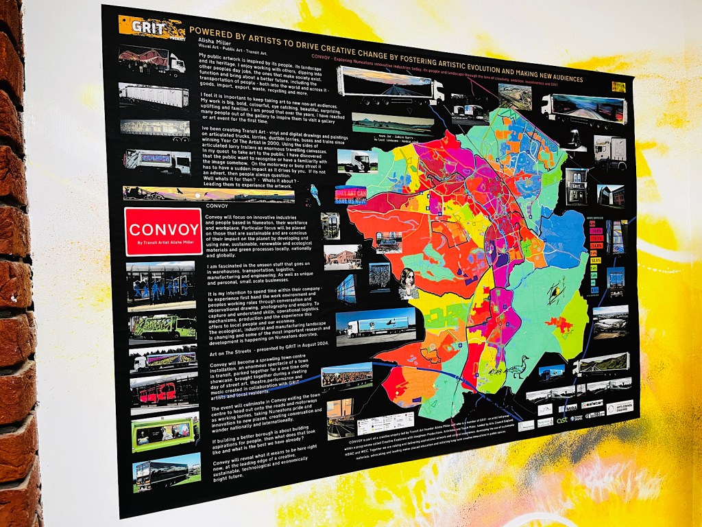 A poster on a wall on an art gallery that displays art murals painted on lorries