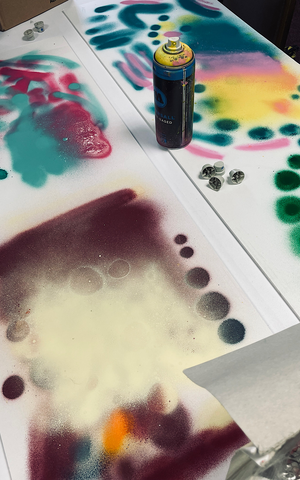 A spray paint can on a table