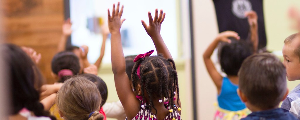 A group of children take part in a dance workshop