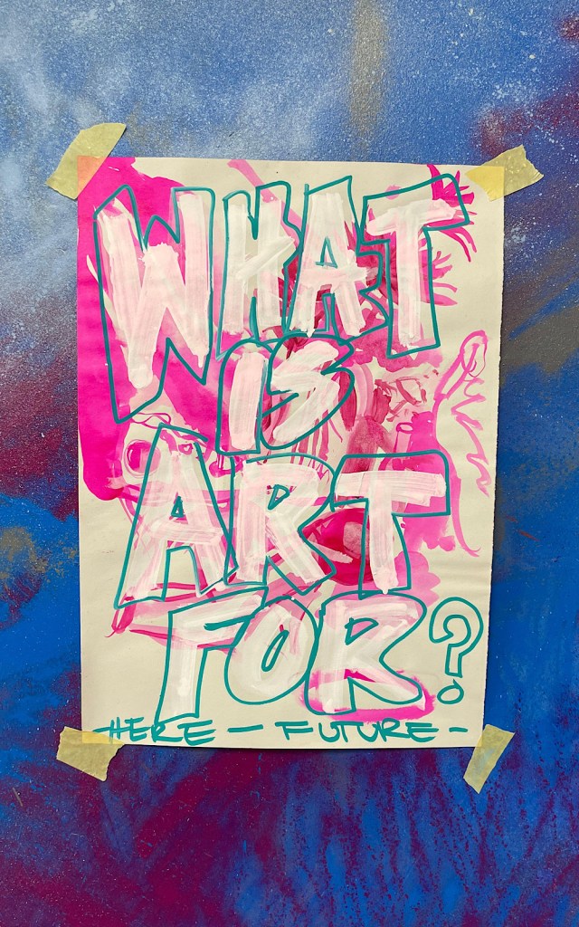 A poster says ‘What is art for?’
